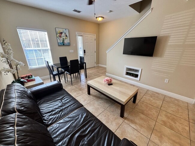 Building Photo - Fully Furnished 3-Bedroom Townhome