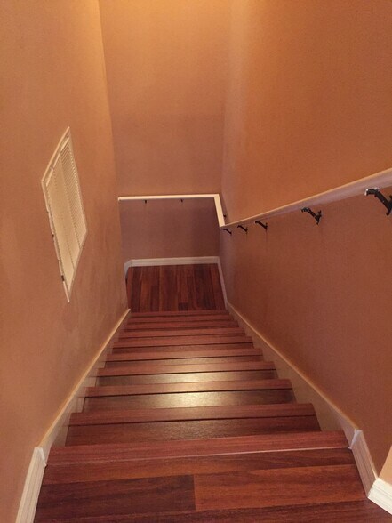 Stairs going up from garage - 4045 Pemberly Pines Cir