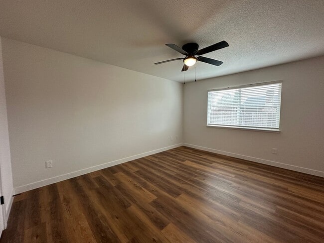 Building Photo - Updated Home with Island Kitchen, LVP Flooring, and Yard Care Included!