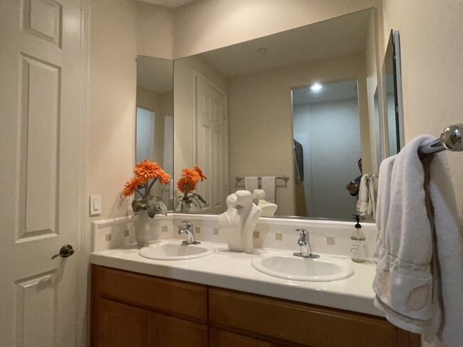 Guest's His & Hers Double Vanities - 18 Vista Mirage Way