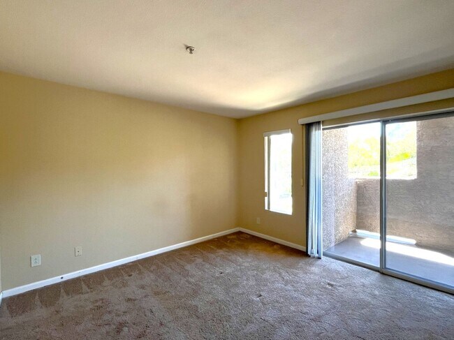 Building Photo - 1BR Condo with Private Balcony, Central A/C & Community Amenities in Corona