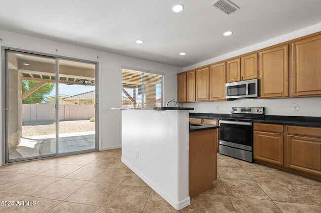 Building Photo - 11723 W Port Au Prince Ln