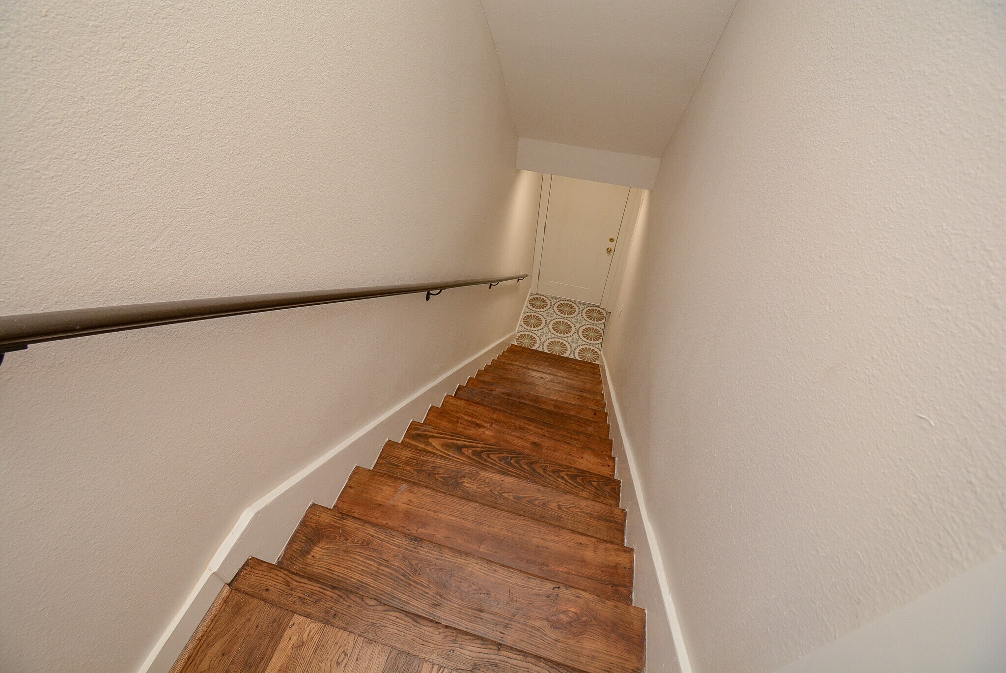 Wood stairs lead up to Unit B from front entrance - 2916 Arbor St