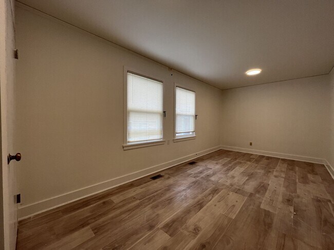 Building Photo - Expansive 4BR 2,900+ Sq Ft Home with Theater-Style Living Room & Bonus Hobby Workshop