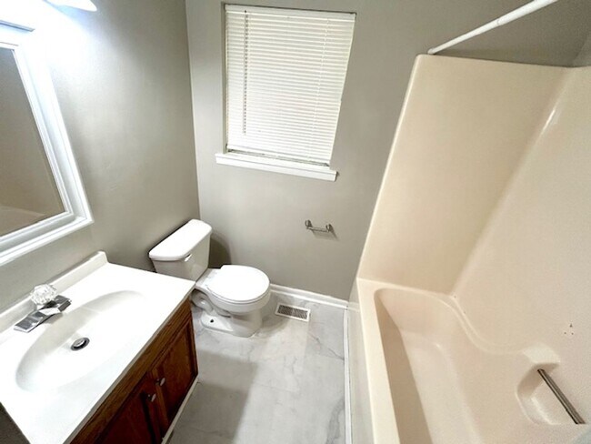 Building Photo - Spacious 4-Bedroom, 2-Bath Home Located in...