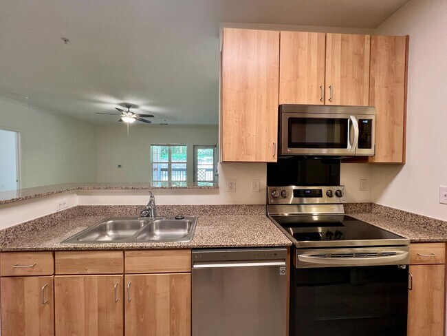 Building Photo - 3-Bed, 2-Bath Condo with Garage! One month...