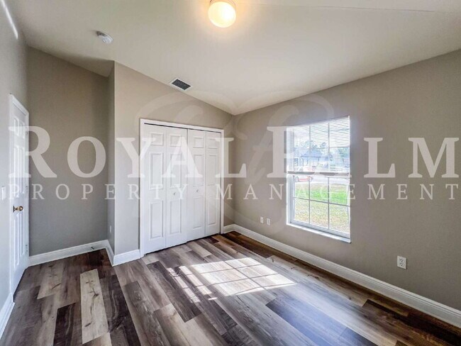 Building Photo - New Year, New House? 3BR/2BA Lehigh Acres Home with Garage, Lawn Care, and Big Main Character Energy