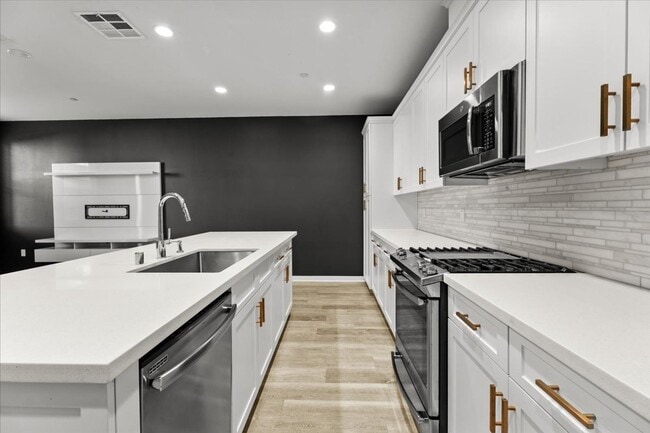 Building Photo - Modern 3-Bedroom Townhome with Luxe Finishes and Private Garage