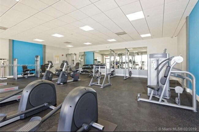 Building Photo - 3675 N Country Club Dr