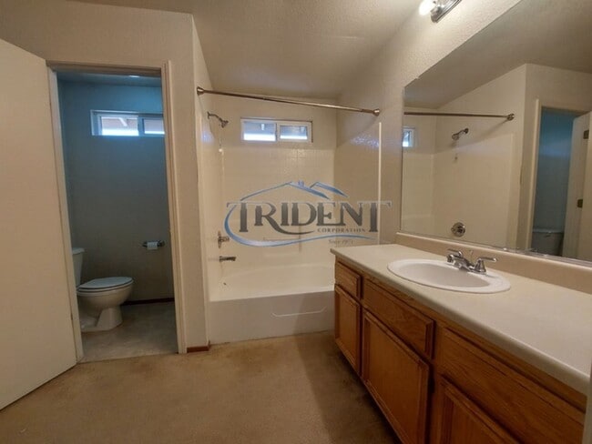 Building Photo - Small pet friendly duplex with front yard landscaping included