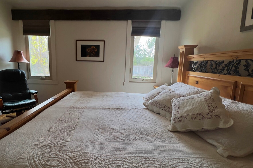Bedroom with king-sized bed - 3575 N Brookside Ln