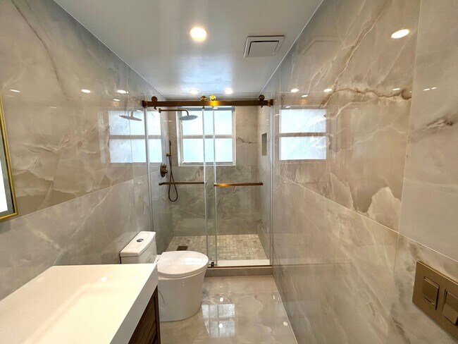 Building Photo - Fully Renovated East-Facing 2BR/2BA + Bonus Room | Ocean Views | In-Unit W/D