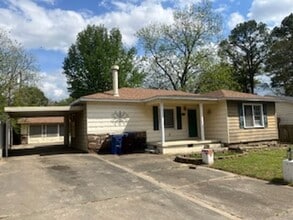 Building Photo - Two Bedroom/One bath home/Extra room off the carport for bedroom