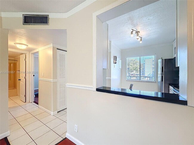 Building Photo - 8740 N Sherman Cir