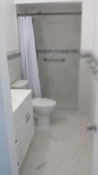 Bathroom w/ walk in shower - 450 NW 20th St