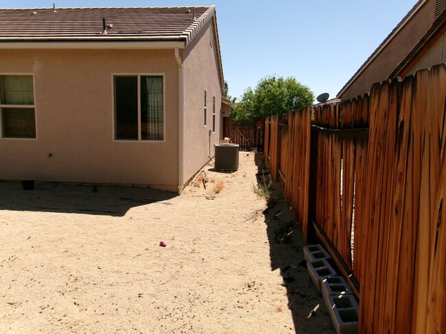 Building Photo - Spacious home located in gated community.