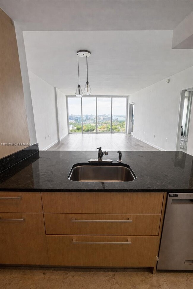 Building Photo - 10275 Collins Ave