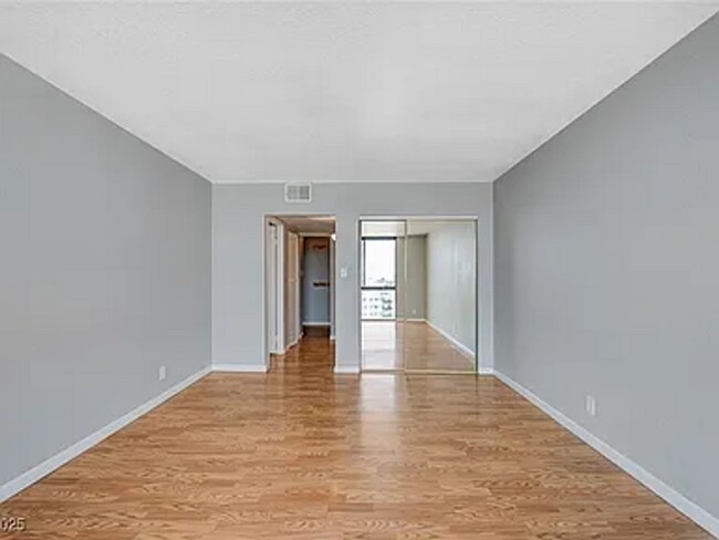 Building Photo - Enjoy resort-style living in this 2 Bed 2 Bath Condo with Stunning Strip Views in the Wimbledon C...