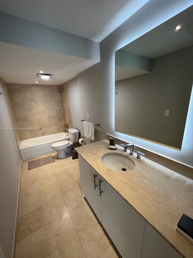 Building Photo - 10275 Collins Ave