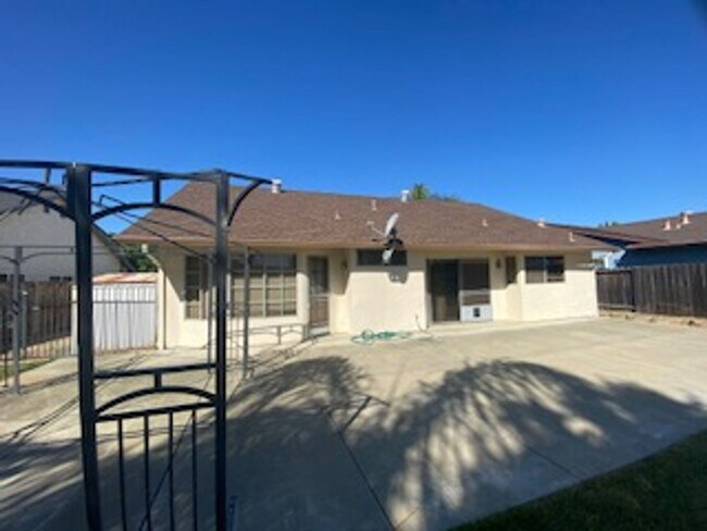 Building Photo - Huge semi-private Backyard with Large Patio!