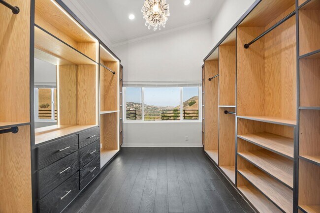 Building Photo - Modern Elegance Meets Scenic Privacy in Be...