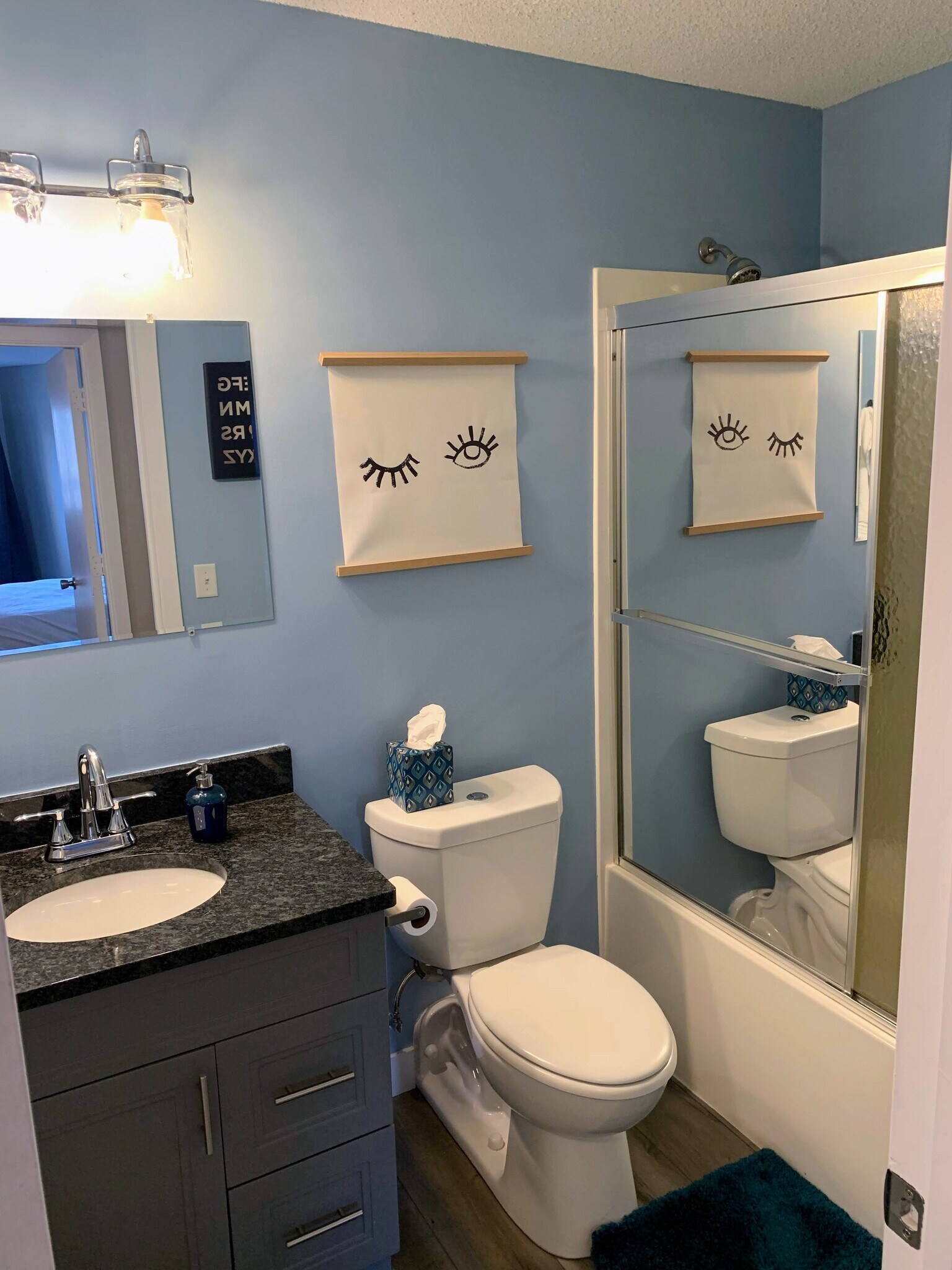 Bathroom with full tub/shower and storage closet - 26 10th St W