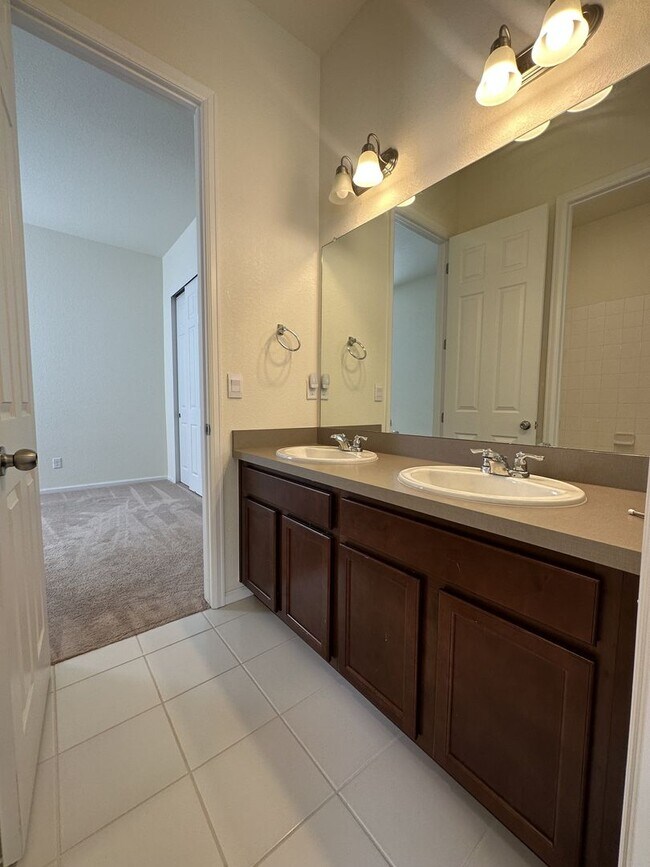 Building Photo - Modern 4-Bed Ranch in Erie with 13-Ft Ceil...