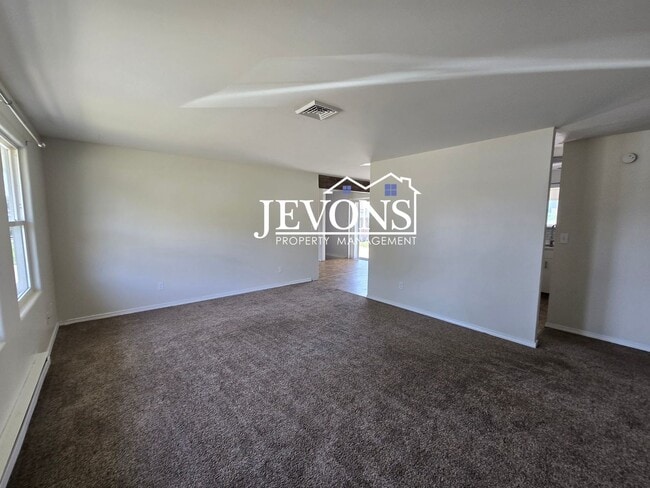 Building Photo - $500 Rent Credit | Spacious 4-bedroom home...