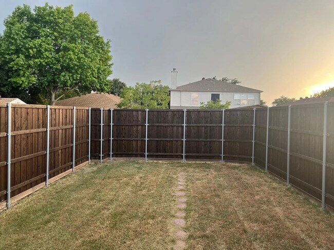 Large backyard with privacy fence - 111 Cobblestone Dr