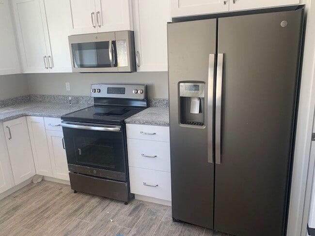 Building Photo - Brand NEW  Townhome!