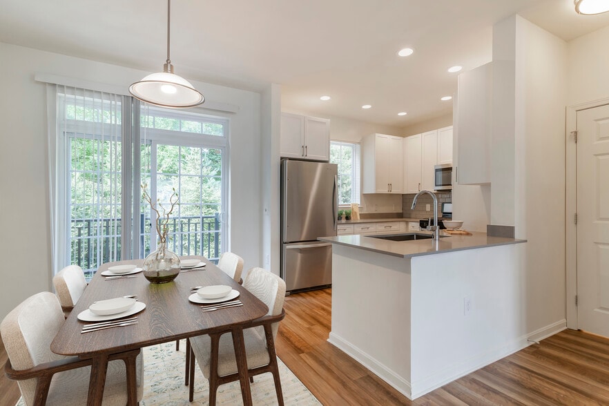 Renovated Package II kitchen and dining area with hard surface flooring - Avalon Northborough