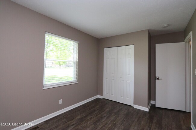 Building Photo - 6810 Village Green Blvd