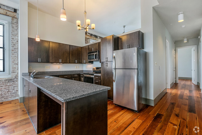 Reclaimed lumber wood floor apartment for rent New Orleans, LA Josephine Lofts - Josephine Lofts