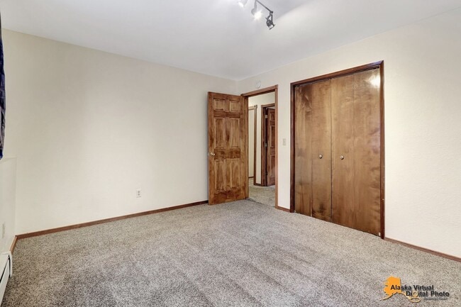 Building Photo - Spacious Home with Garage & Fenced Yard Near JBER & Major Hospitals