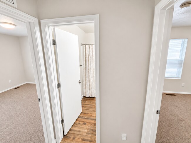 Building Photo - Easy-Living 3 Bed, 2 Bath Home with Double Garage, Pool Access & Private Courtyard