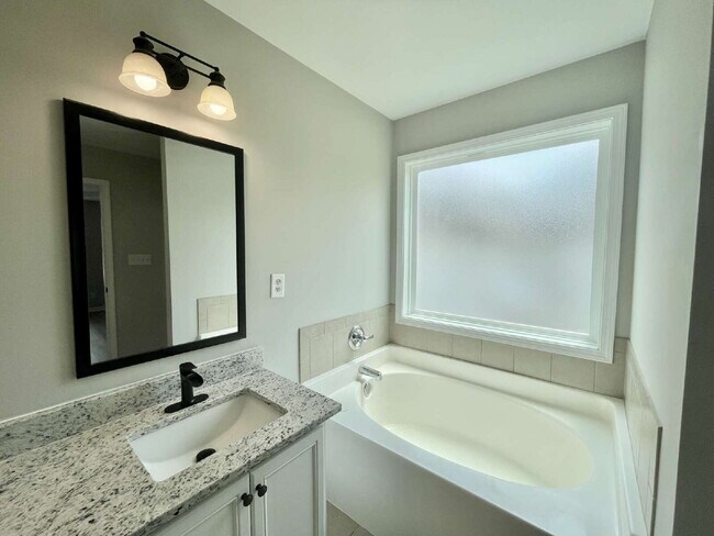 Building Photo - 3-Bed, 2 And A Half Bath Haven With Bonus ...