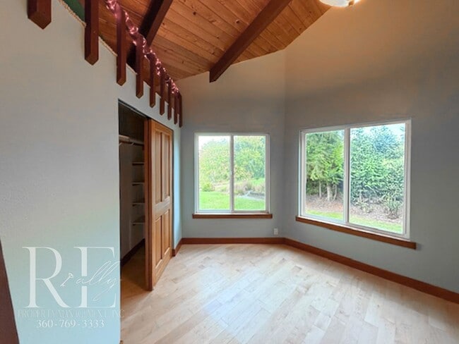 Building Photo - Waterfront Rustic Retreat with Vaulted Ceilings, Picture Windows & Lofted Nook