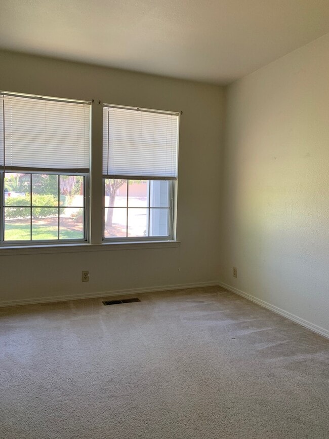 Building Photo - Spacious 3-Bedroom Home with Greenbelt Views & Landscaping Included