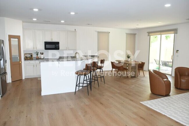 Building Photo - 3 Bedroom + Den Home with Pool & Putting Green – Pool Service Included!