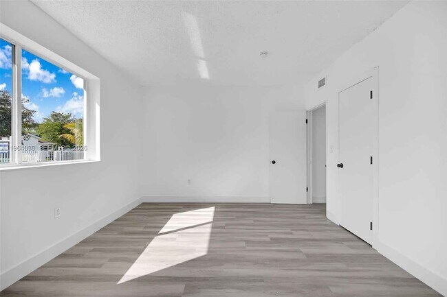 Building Photo - 1391 NW 102nd St