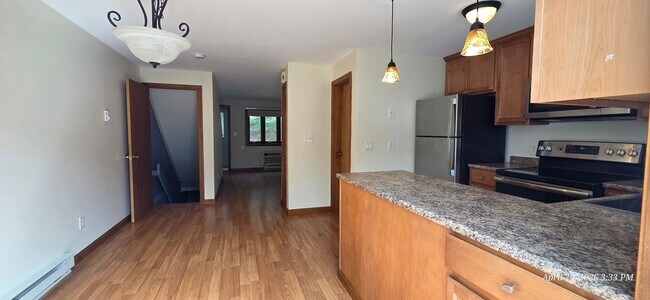 Building Photo - Bright & Spacious 2BR Townhome w/ Finished Basement, Deck & Parking
