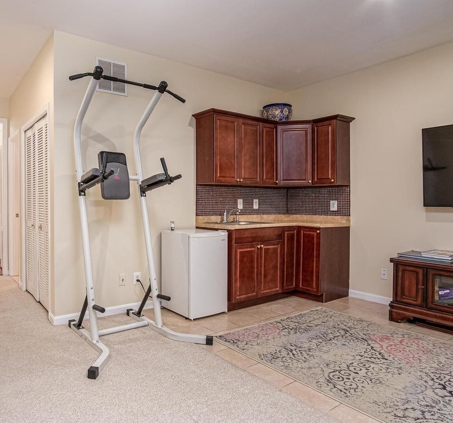 Living room/kitchenette (some furniture included/upgraded) - 1179 Cypress Tree Pl