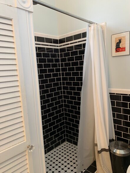 Upstairs bath with tub and separate walk in shower. - 1316 Pleasant St