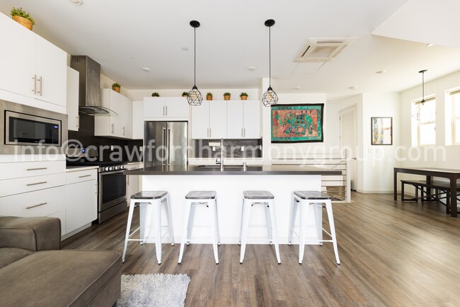 Maximize seating at the kitchen island counter. - 459 Lug Ln