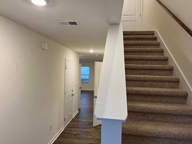 Building Photo - Beautiful New Construction 3 bedroom 2.5 Condo   with garage- Water, trash & sewer incuded!