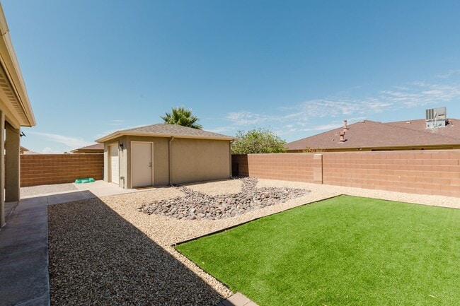 Building Photo - Meticulously kept 4 bedroom home with RV Parking/Hook ups