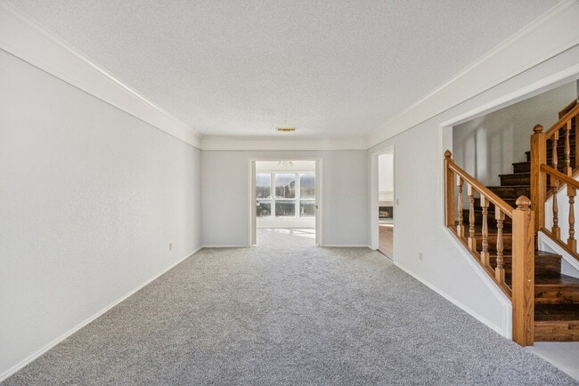Building Photo - "Coming Soon! Spacious 4-Bedroom, 2.5-Bath Living Meets Storybook Backyard Charm!"