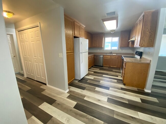 Laundry in hallway of kitchen - 1107 Niantic St