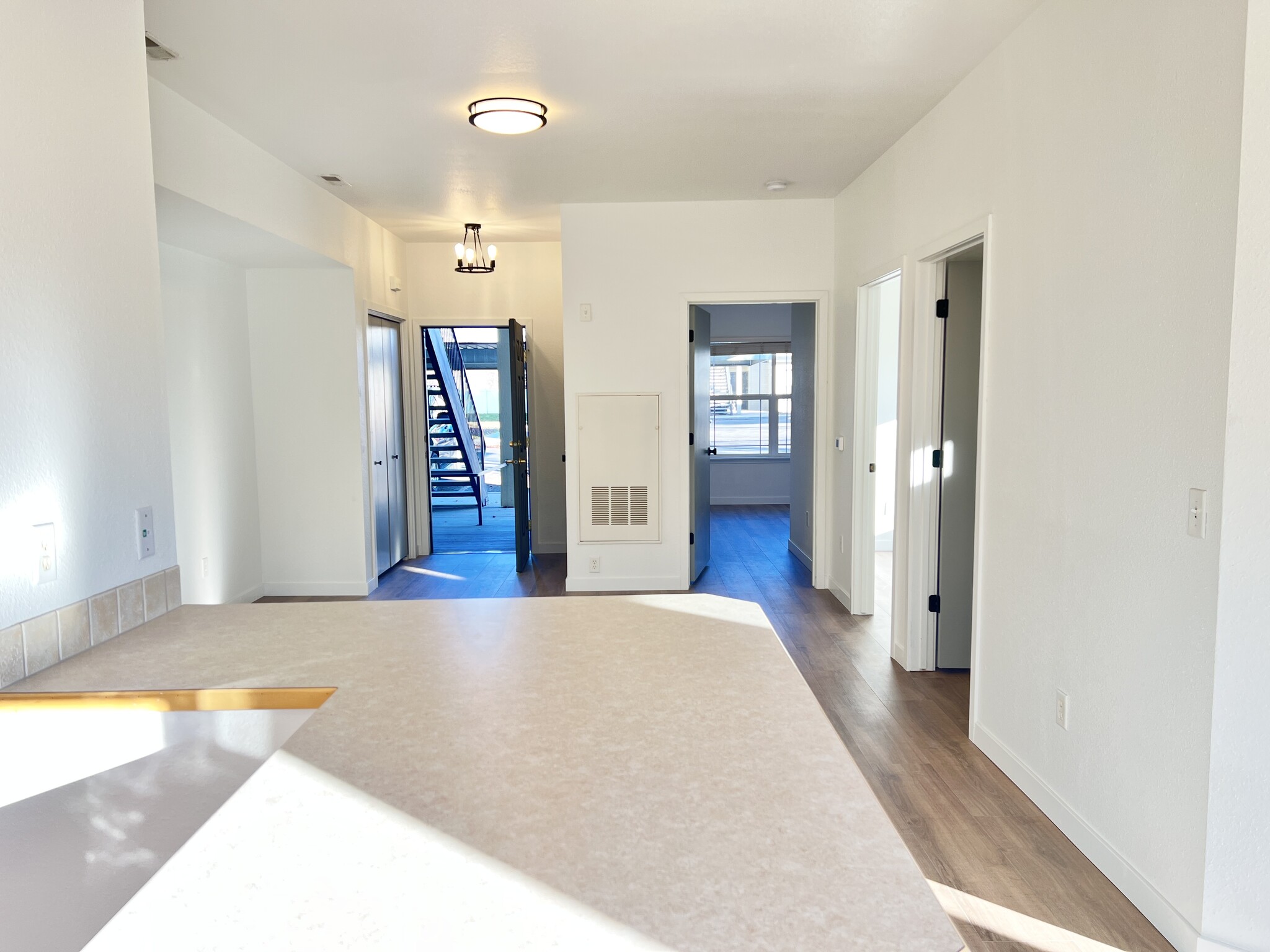 Living Room and Entrance Door (View from Kitchen) - 139 N Plummer Rd