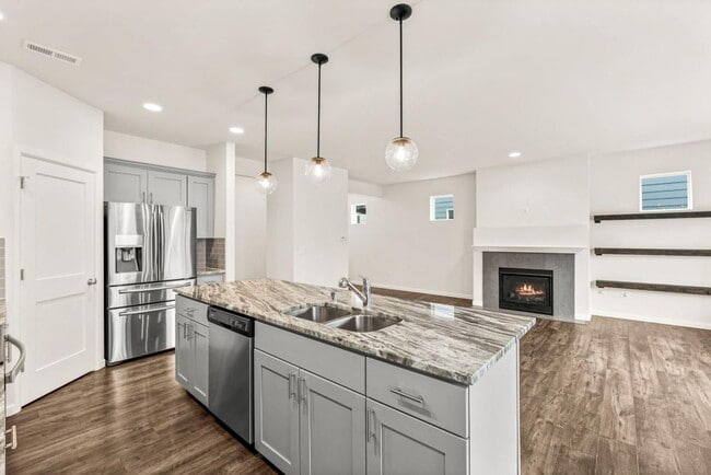 Building Photo - Spacious 4-Bedroom Home with Quartz Counters, Fully Fenced Yard & 2-Car Garage in Yelm!